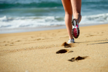 EL top 10 de canciones para salir a correr por la playa